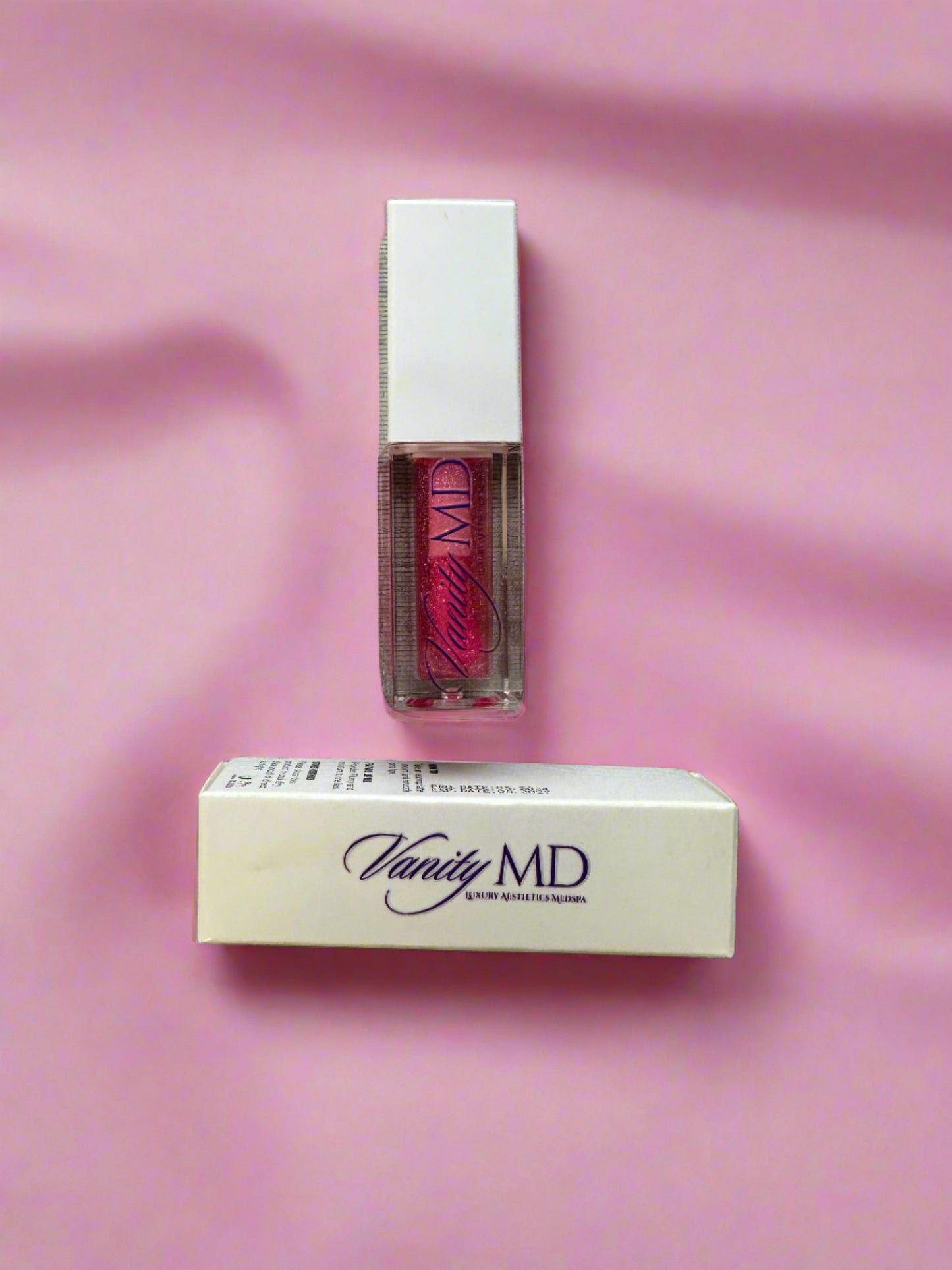 lip plumping gloss maximum volume  lipstick